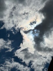 Sunlight Breaking Through Dark Storm Clouds