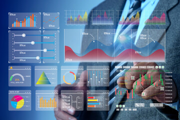Businessman analyst manages the system database, and analysis data plans, and reports GDP marketing KPI sale. shows a dashboard chart. analytics business concept