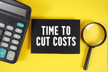 Time to Cut Costs text with magnifying glass anc calculator on yellow background
