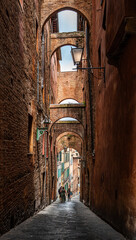 narrow street in Siena Italy