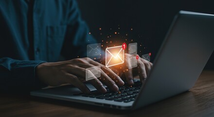 Person typing on a laptop with glowing email and document notifications appearing