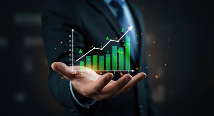 Businessman presents a glowing green bar chart showing upward financial growth and progress