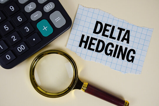 Delta Hedging text with magnifying glass anc calculator on yellow background