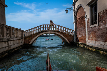 bridge in venice with gondola