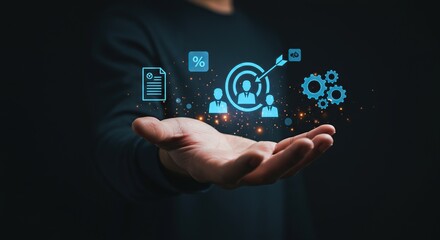 Human hand displaying digital icons representing business strategy and team collaboration