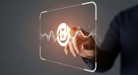 Hand interacting with a digital interface displaying a bitcoin symbol and wave patterns around it