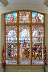 Heritage colonial stained glass window in the Old City Hall building, Toronto, Canada