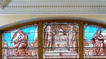 Heritage colonial stained glass window in the Old City Hall building, Toronto, Canada