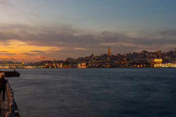 Galata Tower and Golden Horn bay at night. Istanbul, Turkey