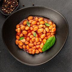 Bean stew tomato sauce cranberry beans vegetable dish beans borlotti fresh delicious gourmet food background on the table rustic food top view copy space keto and paleo diet vegan and vegan food