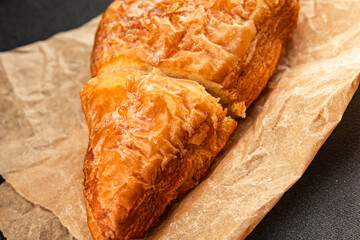 Triangle cake almond puff pastry sweet dessert fresh delicious gourmet food background on the table rustic food top view copy space