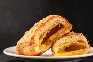 Triangle cake almond puff pastry sweet dessert fresh delicious gourmet food background on the table...
