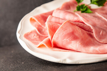 Ham slices meat spam pork fresh delicious gourmet food background on the table rustic food top view...