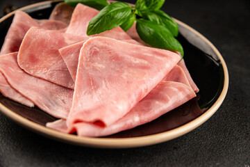 Ham slices meat spam pork fresh delicious gourmet food background on the table rustic food top view...