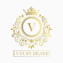 Luxurious and elegant logo design with a stylized letter V in gold featuring regal floral embellishments