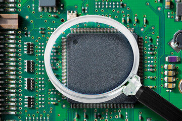 Electronic componensts seen through a magnifying glass