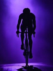 Obraz premium The cyclist's dynamic pose on a sleek road bike, wearing sportswear and helmet, silhouetted against high contrast lighting capturing urban scene vibes with a street racing feel.