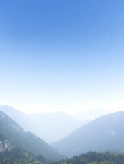 Mountain layers under the clear blue sky