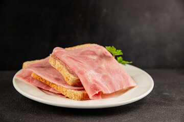 Sandwich ham slices meat spam pork fresh delicious gourmet food background on the table rustic food top view copy space