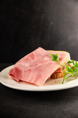 Sandwich ham slices meat spam pork fresh delicious gourmet food background on the table rustic food top view copy space