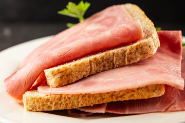 Sandwich ham slices meat spam pork fresh delicious gourmet food background on the table rustic food top view copy space