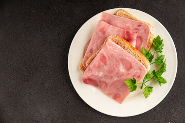 Sandwich ham slices meat spam pork fresh delicious gourmet food background on the table rustic food top view copy space