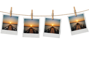 Polaroid-Style Photos on Wooden Clothesline with Scenic Landscapes Against White Background.
