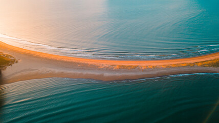 Golden Curve Aerial View of Crescent Shoreline at Sunset (1)
