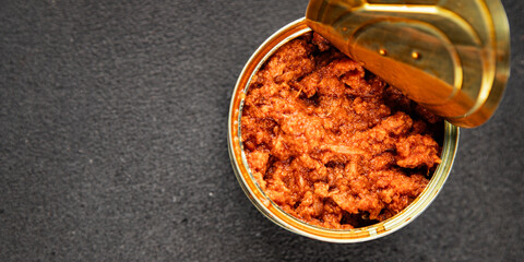 Tuna tomato sauce canned fish seafood fresh delicious gourmet food background on the table rustic food top view copy space keto and paleo diet vegan food pescetarian diet