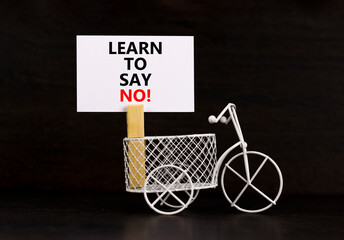 Learn to say no symbol. Concept words phrase Learn to say no on beautiful white paper on wooden...