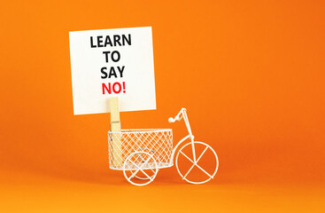 Learn to say no symbol. Concept words phrase Learn to say no on beautiful white paper on wooden...