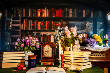 relaxing maximalist library scene with open book burning candles coffee cookies and old library background