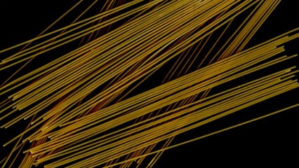 Obraz premium Scan of dry yellow spaghetti or strings on black background. Abstract linear texture with striking contrast.