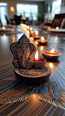 Ganesha figurine, lit candles