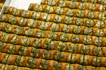Cultural baklava varieties on the streets of Istanbul on a metal tray