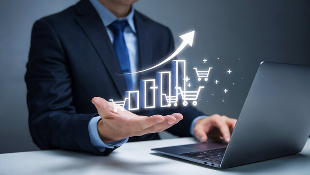 Businessman presenting a glowing digital graph with shopping carts and an upward arrow symbolizing sales growth and e commerce success