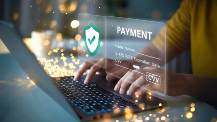Person typing credit card details on a laptop for secure online payment with a digital shield icon and bokeh lights