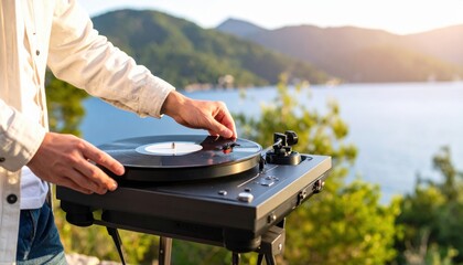 Man Playing Vinyl Record Turntable by the Sea