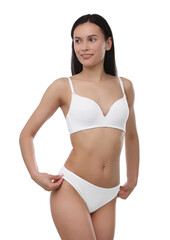 Fototapeta premium Beautiful woman with perfect slim body on white background