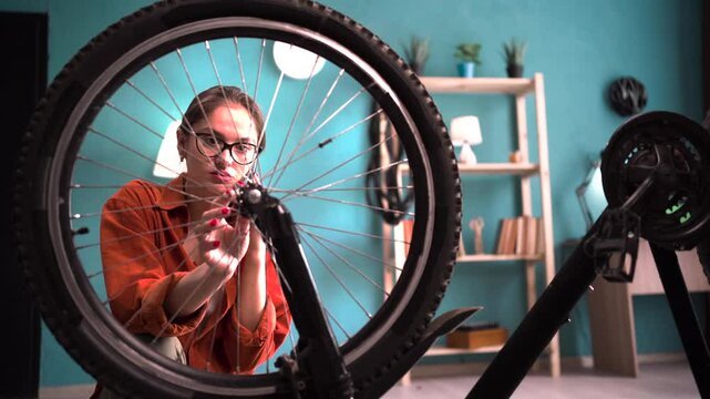 Phone call woman talking and communication with mechanic asking him to help repair her bicycle - Powered by Adobe