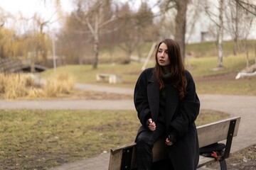 Contemplating introspection in a tranquil park on a cool autumn day