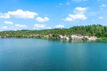 The abandoned Korostyshiv quarry, with its deep blue waters and rugged cliffs, has become a scenic...