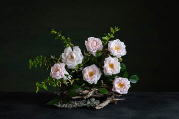 Romantic 3D floral arrangement with pink roses, honeysuckle, and driftwood in soft natural tones. Ideal for eco-themed, seasonal, or floral design projects.