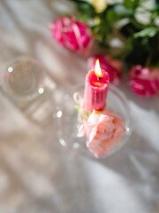 Beautiful pink and purple handmade beeswax candles. Candles for Love, femininity and sexuality.  Aromatherapy. Wax candles. Selective focus