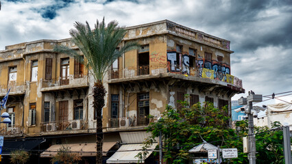 abandoned building, urban decay, graffiti, old architecture, weathered facade, Tel Aviv, Israel...