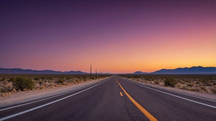 Naklejka premium Stunning Sunset Over a Long, Empty Highway Stretching Across Desert Landscape With Mountain Silhouettes in the Background