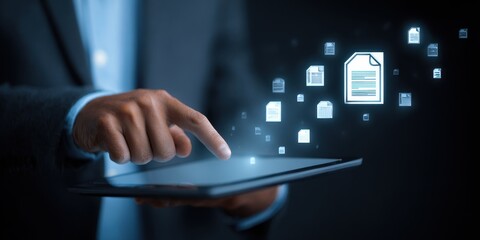 Man's finger touching tablet; digital documents float around.  Dark, blue, technological