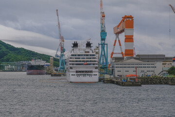Modern ultra luxury cruise ship cruiseship liner Ocean Fuji in dry dock maintenance modernization...