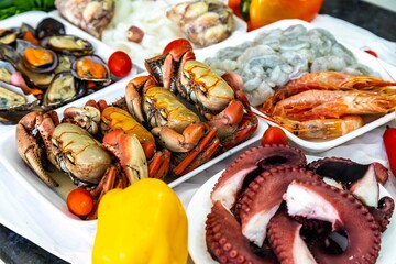 Traditional seafood paella ingredients with a variety of selected seafood. Refined and gourmet cuisine