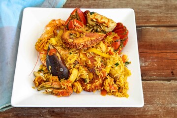 Traditional seafood paella with a variety of selected seafood. Refined and gourmet cuisine